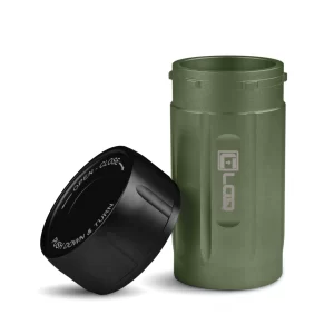 a green body and black cap corloq everyday carry bug out tactical container shown with cap removed